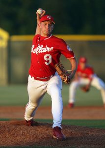 Baseball player dressed in red top, red hat and white bottoms throws a baseball: How To Throw a Baseball - FAST! [MindfuseBaseball.com]